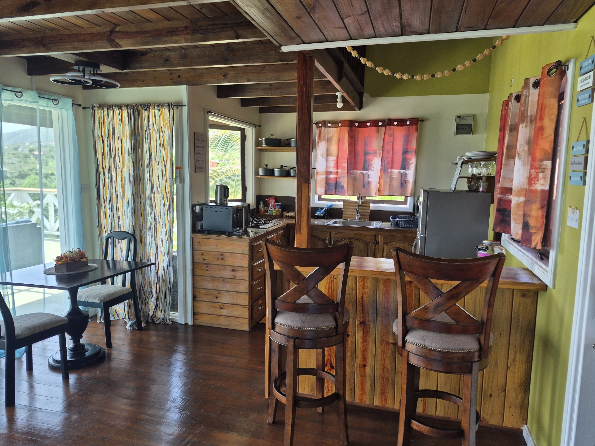 Dining corner and breakfast bar inside the villa kitchen