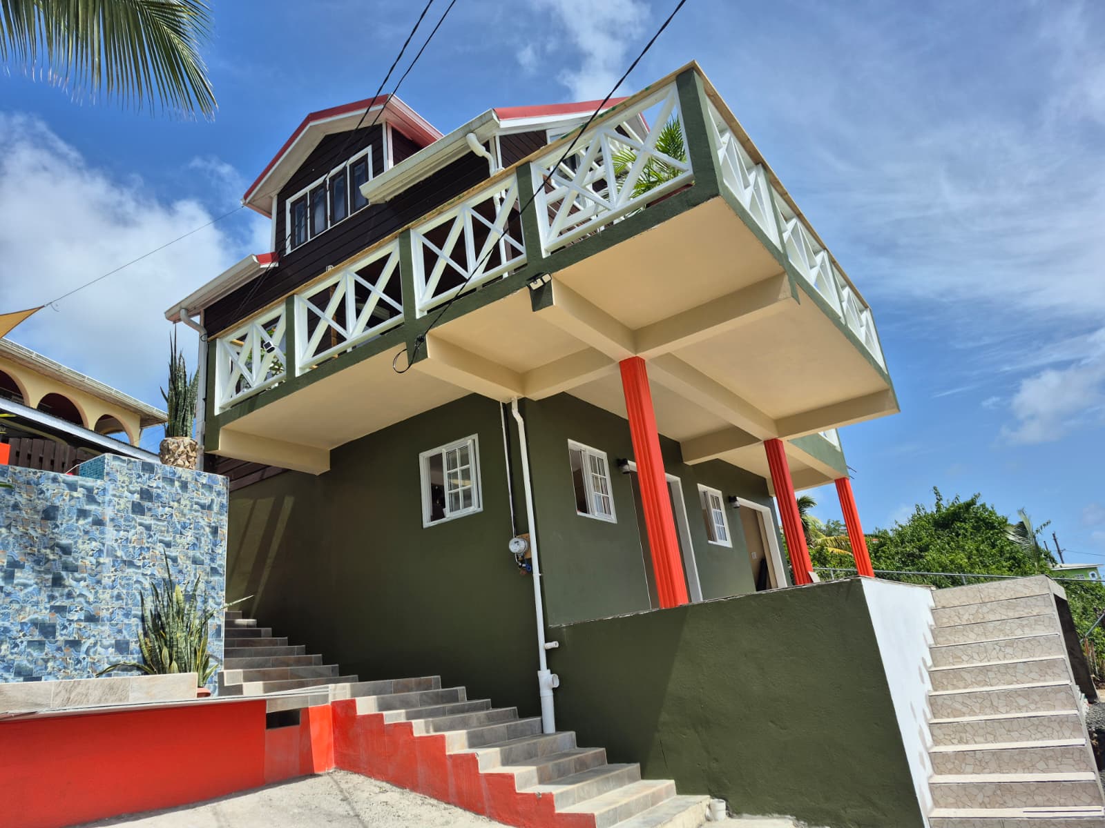 Angled exterior view of Southern Sunset Villa in daylight