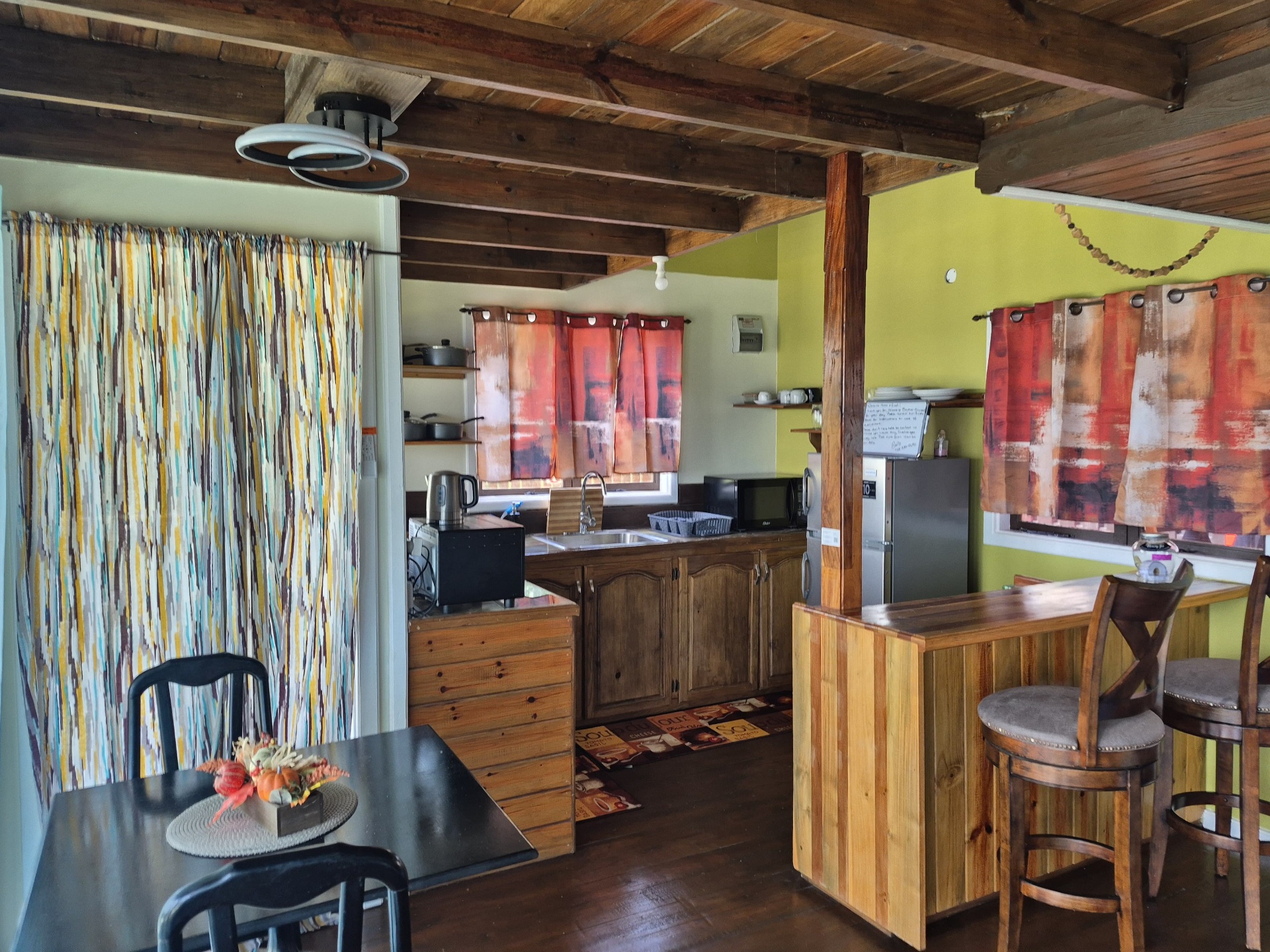 Wood kitchen and breakfast bar inside the villa